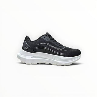 FWSports Shoes Alo Runner black and white lightweight low-top sneakers with a cushioned midsole and breathable upper.