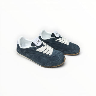 FWSports Shoes Alo Yoga Sunset blue suede low-top sneakers with white laces and gum rubber soles.
