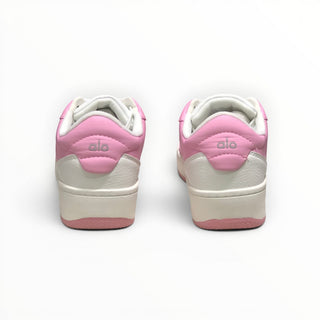 FWSports Shoes Alo Yoga Recovery Mode low-top sneakers in pink and white, showing the rear view with branded heel tabs.