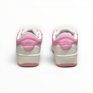 FWSports Shoes Alo Yoga Recovery Mode low-top sneakers in pink and white, showing the rear heel view with logo detail.