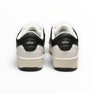 FWSports Shoes Alo Yoga Recovery Mode low-top sneakers in black and white, showing the rear heel view with logo.