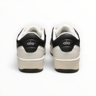 FWSports Shoes Alo Yoga Recovery Mode low-top sneakers in black and white, showing the rear heel view with logo.
