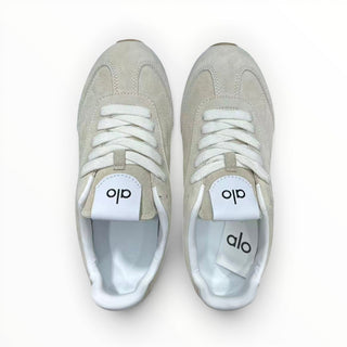 FWSports Shoes Alo Yoga Sunset beige low-top lifestyle sneakers with lace-up closure and cushioned interior.