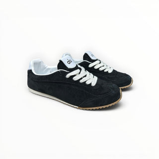 FWSports Shoes Alo Yoga Sunset black low-top lifestyle sneakers with white laces and a gum rubber outsole.