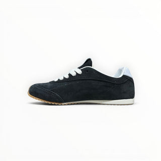 FWSports Shoes Alo Yoga Sunset black low-top lifestyle sneakers with white laces and a gum rubber outsole.