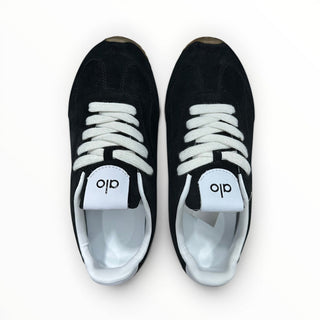 FWSports Shoes Alo Yoga Sunset black low-top sneakers with white laces and cushioned interior, top-down view.