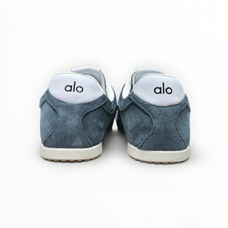 FWSports Shoes Alo Yoga Sunset blue suede low-top sneakers viewed from the back with white heel tabs and logo
