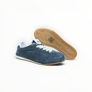 FWSports Shoes Alo Yoga Sunset blue suede low-top sneakers with white laces and gum rubber outsoles.