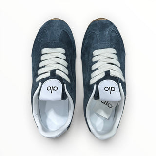 FWSports Shoes Alo Yoga Sunset blue suede low-top sneakers with white laces and cushioned interior, top-down view.