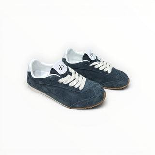 FWSports Shoes Alo Yoga Sunset blue suede low-top sneakers with white laces and a gum rubber sole.