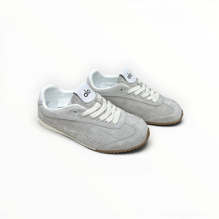 FWSports Shoes Alo Yoga Sunset grey suede low-top lifestyle sneakers with white laces and a gum rubber outsole.