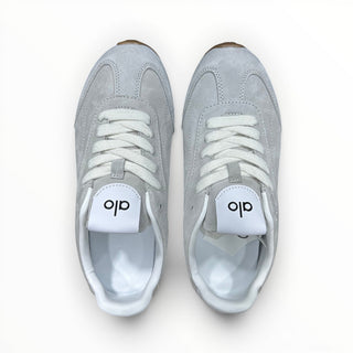 FWSports Shoes Alo Yoga Sunset grey low-top sneakers with white laces and cushioned interior, top-down view.