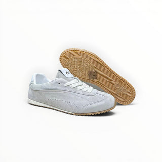 FWSports Shoes Alo Yoga Sunset grey low-top sneakers with white laces and a gum rubber outsole on a white background.