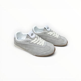 FWSports Shoes Alo Yoga Sunset grey suede low-top sneakers with white laces and a gum rubber outsole.