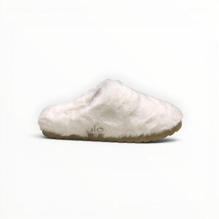 FWSports Shoes Alo Yoga white faux fur recovery slipper with a plush upper and a textured tan sole for indoor comfort.
