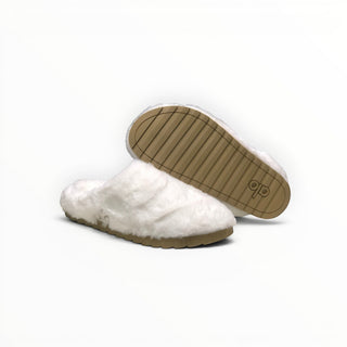 FWSports Shoes Alo Yoga white faux fur recovery slippers with a tan rubber sole, shown from the side and bottom.