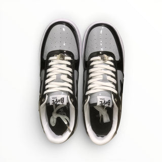 FWSports Shoes BAPE STA low-top sneakers in black and grey patent leather with white laces and cushioned footbed.