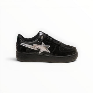 FWSports Shoes BAPE STA low-top sneakers in black patent leather with a metallic silver star logo on the side.