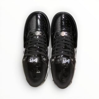 FWSports Shoes BAPE STA low-top sneakers in glossy black patent leather with lace-up closure, top-down view.