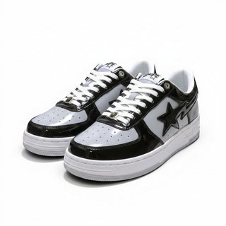 FWSports Shoes BAPE STA low-top sneakers in black and white patent leather with signature star side panel detail.