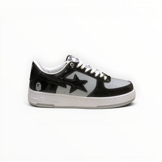 FWSports Shoes BAPE STA low-top sneakers in black and white with a signature star logo and lace-up closure.