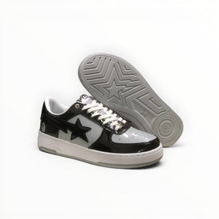 FWSports Shoes BAPE STA low-top sneakers in black and white patent leather with star logo and grey rubber outsole.