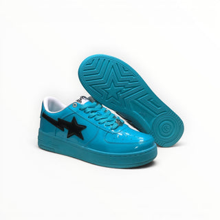 FWSports Shoes BAPE STA low-top sneakers in glossy blue patent leather with a black star logo and matching blue outsole.