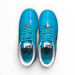 FWSports Shoes BAPE STA low-top sneakers in glossy blue patent leather with black accents and lace-up closure