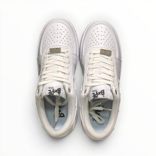 FWSports Shoes BAPE STA low-top sneakers in triple white with lace-up closure and perforated toe box, top view.