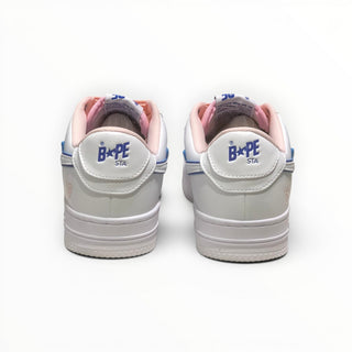 FWSports Shoes BAPE STA low-top sneakers in white and peach with blue branding on the heel, rear view.