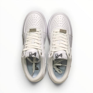 FWSports Shoes BAPE STA low-top sneakers in triple white with lace-up closure and perforated toe box, top view.