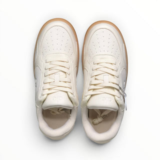 FWSports Shoes Alo Yoga Recovery Mode beige low-top sneakers with gum soles and lace-up closure, top view.