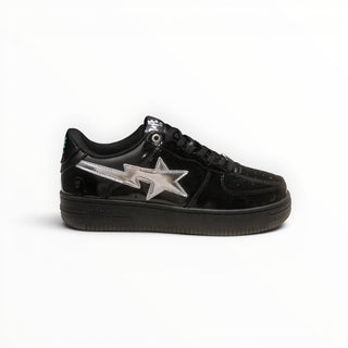 FWSports Shoes BAPE STA low-top sneakers in black patent leather with a metallic silver star logo on the side.
