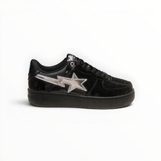 FWSports Shoes black patent leather BAPE STA low-top sneakers with a metallic silver star logo on the side.