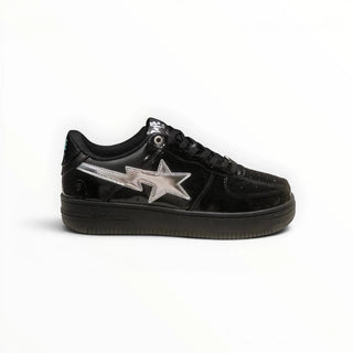 FWSports Shoes BAPE STA low-top sneakers in black patent leather with a metallic silver star logo on the side.