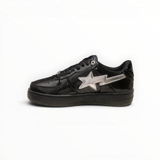 FWSports Shoes black patent leather low-top sneakers featuring a silver star logo and lace-up closure.