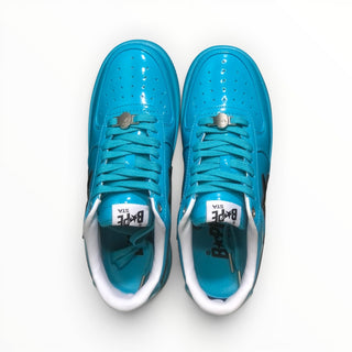 FWSports Shoes BAPE STA low-top sneakers in glossy blue and black patent leather with lace-up closure, top-down view.