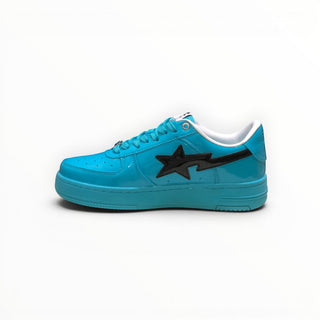FWSports Shoes BAPE STA low-top sneakers in glossy blue patent leather with a black star logo and white interior lining.