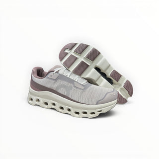 FWSports Shoes On Running Cloudmonster Void brown running sneakers with breathable mesh and thick CloudTec cushioning.