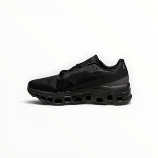 FWSports Shoes Cloudmonster men's black running shoe with oversized CloudTec cushioning and breathable mesh upper.