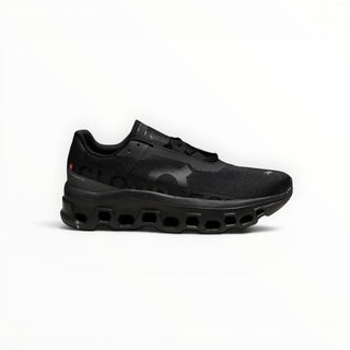 FWSports Shoes Cloudmonster women's black running shoe with oversized CloudTec cushioning and breathable mesh upper.