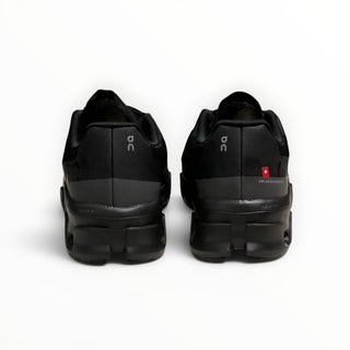 FWSports Shoes Cloudmonster men's running shoes in black, showing the rear view with oversized CloudTec cushioning.