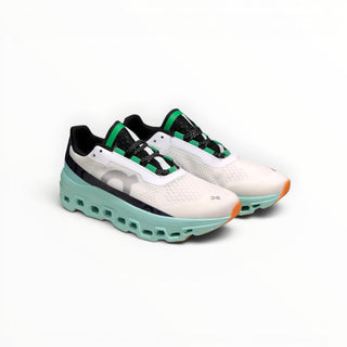 FWSports Shoes On Cloudmonster men's running shoes in Brook Green with breathable mesh and oversized CloudTec cushioning.