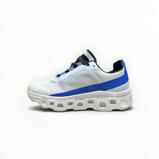 FWSports Shoes Cloudmonster women's running shoe in frost white and cobalt blue with oversized CloudTec cushioning.