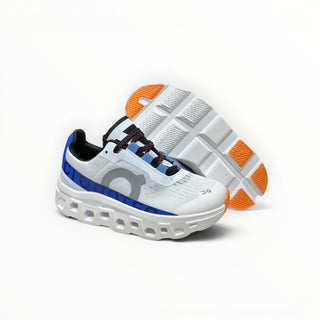 FWSports Shoes Cloudmonster women's running shoes in frost and cobalt with oversized CloudTec cushioning and mesh upper.