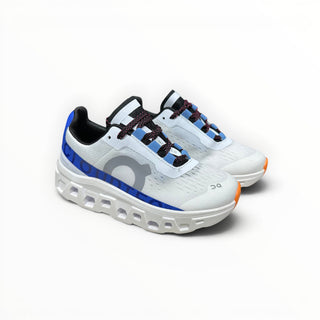 FWSports Shoes Cloudmonster women's running shoes in frost and cobalt with oversized CloudTec cushioning and mesh upper.