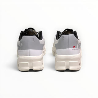 Rear view of white FWSports Shoes Cloudmonster running shoes showing the cushioned sole and heel support details.
