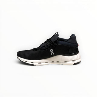 FWSports Shoes CLOUDNOVA women's running shoe in black and white with a sock-like upper and CloudTec cushioning.