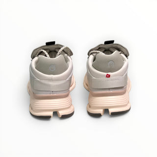 FWSports Shoes Cloudnova women's running shoes in shell powder with sock-like upper and CloudTec cushioning, rear view.