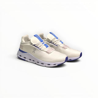 FWSports Shoes Cloudnova women's running sneakers in white and ultramarine blue with a breathable sock-like upper.